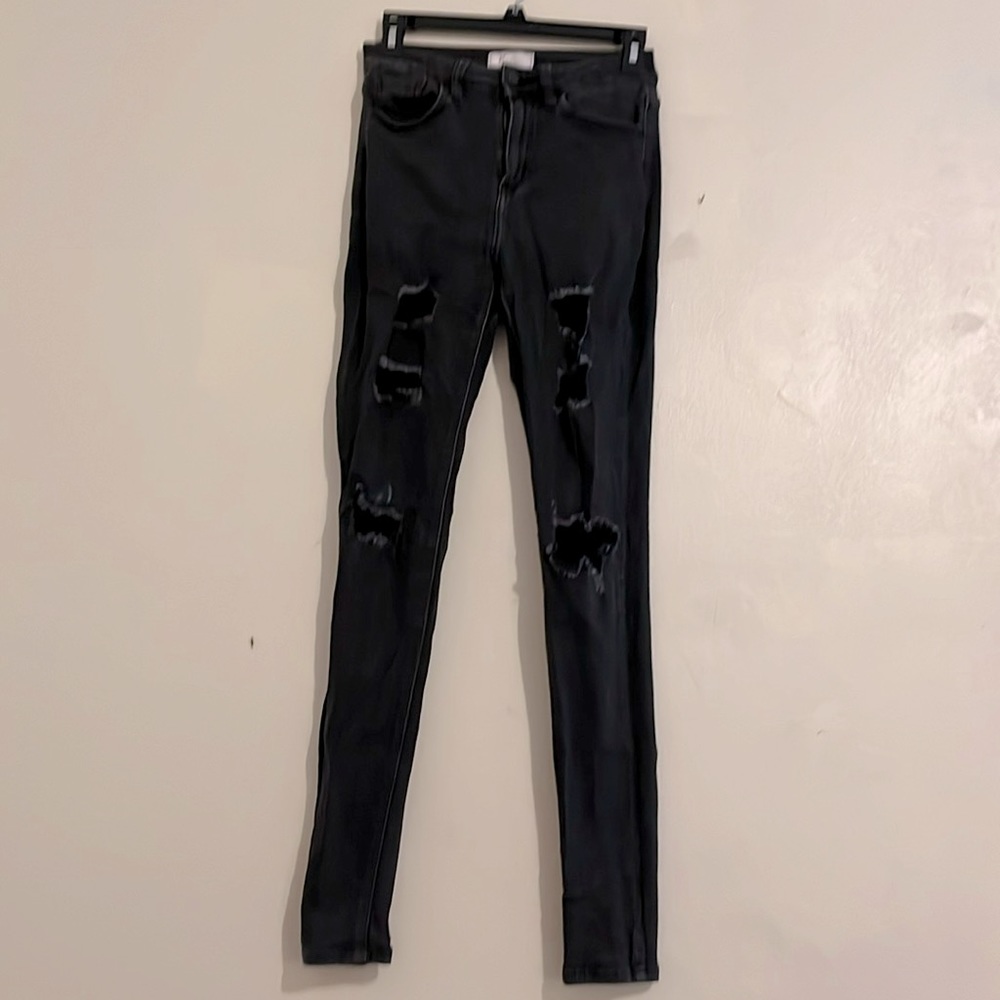 Long distressed skinny jeans purchased at buckle